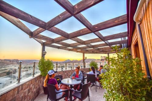 Uma varanda ou terraço em La Maison Hotel