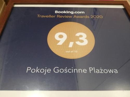 Certifikat, nagrada, logo ili neki drugi dokument izložen u objektu Pokoje Gościnne Plażowa