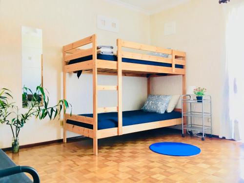 A bed or beds in a room at Casa dos Azulejos