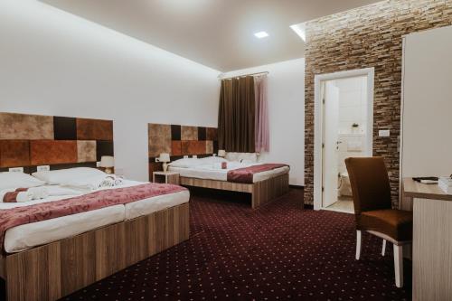 Voodi või voodid majutusasutuse Hotel & Spa Meydan toas