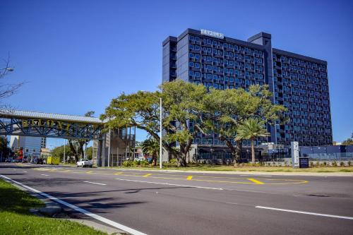 an empty street with a large building in the background at Hotel Legends in Biloxi