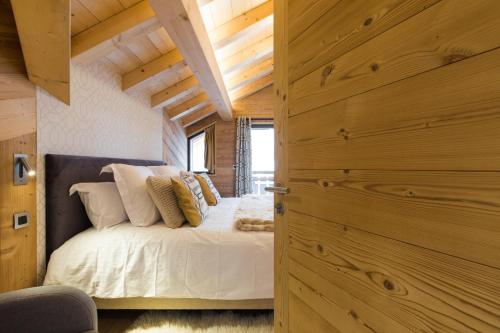 Cama ou camas em um quarto em Chalet sur les monts Morzine