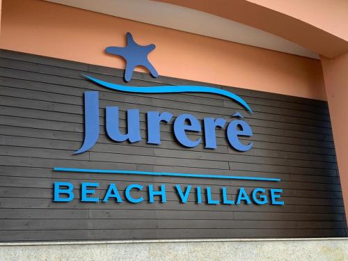 Un certificado, premio, cartel u otro documento en Jurerê Beach Village - Flat na Praia