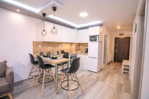 Babylon Park Apartment 주방 또는 간이 주방