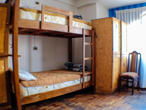 Krevet ili kreveti u jedinici u okviru objekta Hostel Running Chaski