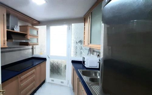 Majoituspaikan Apartamento Realengo Sevilla keittiö tai keittotila