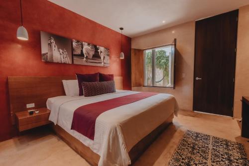 Un pat sau paturi într-o cameră la Casona 61 by GuruHotel