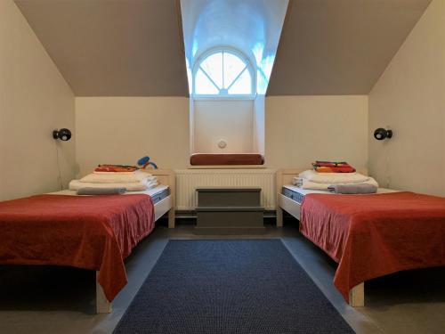 Posteľ alebo postele v izbe v ubytovaní Hostel Suomenlinna