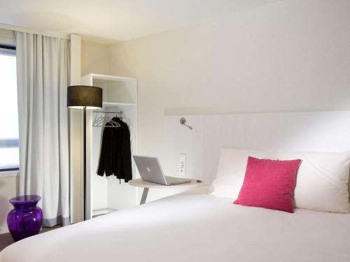 Ένα ή περισσότερα κρεβάτια σε δωμάτιο στο ibis Styles Lille Centre Gare Beffroi