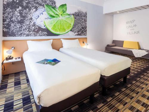 Krevet ili kreveti u jedinici u okviru objekta Ibis Styles Napoli Garibaldi