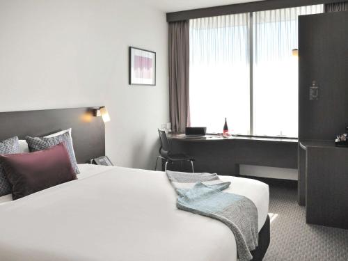 Кровать или кровати в номере ibis Melbourne - Glen Waverley