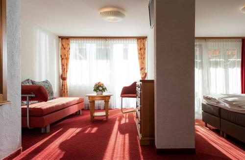 เตียงในห้องที่ Hotel Silberhorn