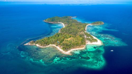 an island in the middle of the ocean at Isla - The Island Experience in El Nido