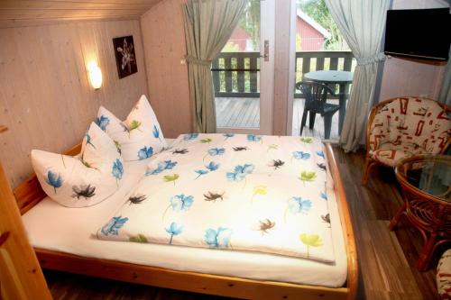 Tempat tidur dalam kamar di Haus Kranich