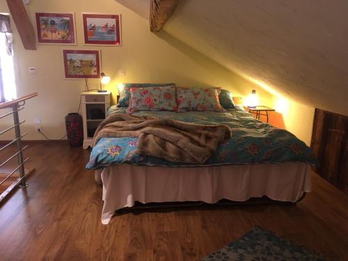 Una cama o camas en una habitación de Chalet Ingas