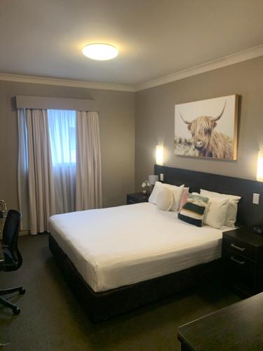 เตียงในห้องที่ Best Western Blackbutt Inn