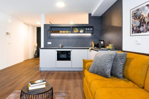 A kitchen or kitchenette at Gerharts Premium City Living - center of Brixen with free parking and Brixencard