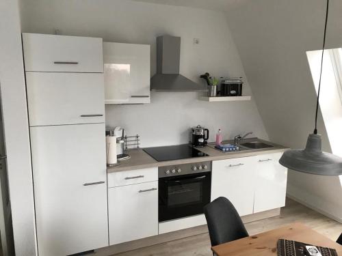 Virtuvė arba virtuvėlė apgyvendinimo įstaigoje Apartment Nummer 5