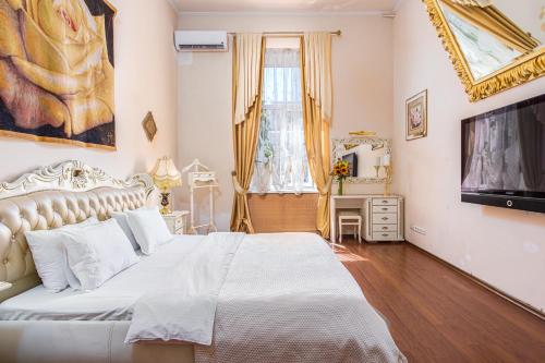 Krevet ili kreveti u jedinici u objektu Ekaterina Apartments - Odessa