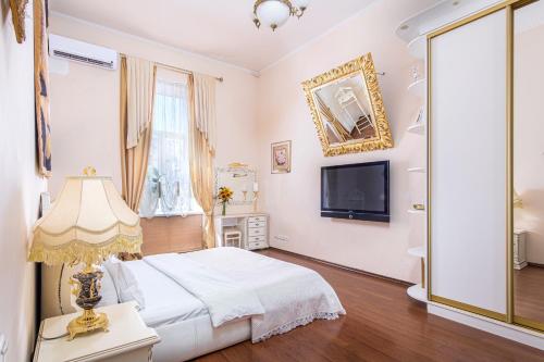 Krevet ili kreveti u jedinici u objektu Ekaterina Apartments - Odessa