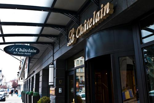 a store front of a building with a sign on it at Hotel Le Châtelain in Brussels