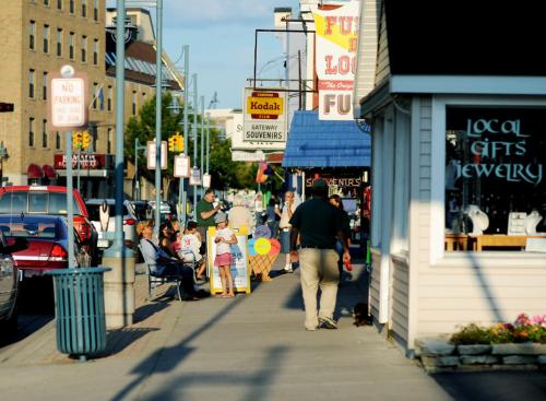 a man and a child walking down a sidewalk at adoba® Lockview in Sault Ste. Marie