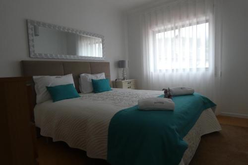 Tempat tidur dalam kamar di Casa Sandra - Apartamento Carlota