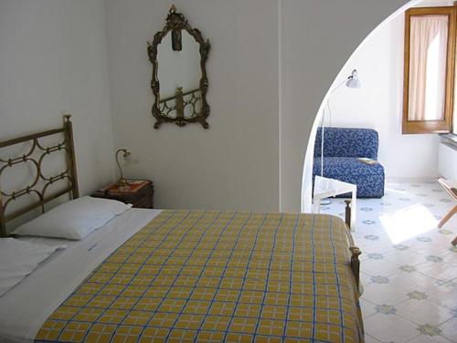 Postel nebo postele na pokoji v ubytování Villa Casale Ravello Residence