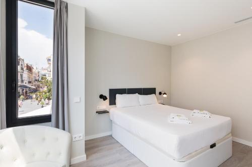 Cama ou camas em um quarto em Sitges Vibe Apartments by Olala Homes