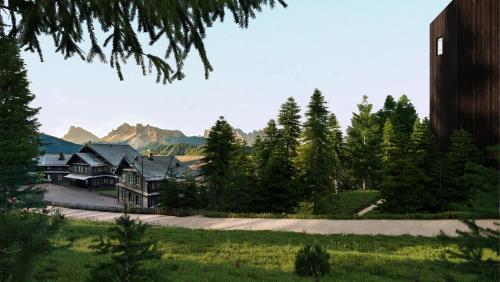 een huis in het midden van een veld met bomen bij Forestis Dolomites in Bressanone