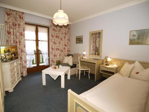 Ліжко або ліжка в номері Xundheits Hotel Garni Eckershof