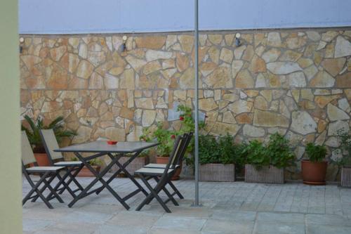 A patio or other outdoor area at Melenia's Sea Front House