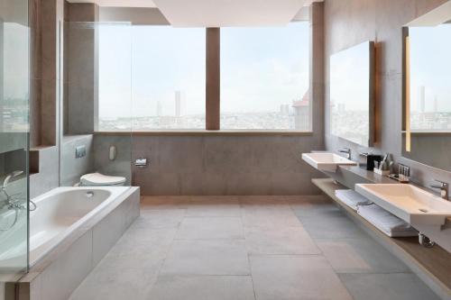 A bathroom at Novotel Jakarta Mangga Dua Square