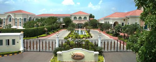 גינה חיצונית ב-The Palms Town & Country Club - Resort