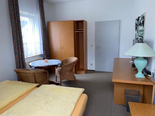 Säng eller sängar i ett rum på 28 qm Apartments am Rosengarten