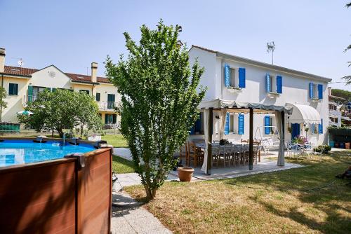 Kolam renang di atau di dekat Cà del Mar rustico a Jesolo con giardino e piscina privati ad uso esclusivo #