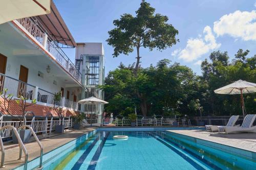 Kolam renang di atau dekat dengan Hotel Mamallaa Heritage