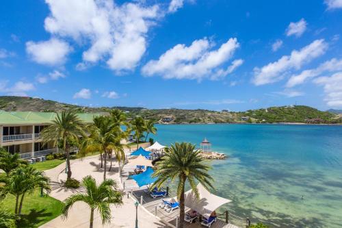 a view of the beach at the resort at St. James's Club Resort - All Inclusive in English Harbour Town