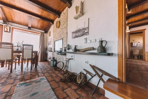 a living room with a table and a dining room at Apartments Bazar in Ulcinj