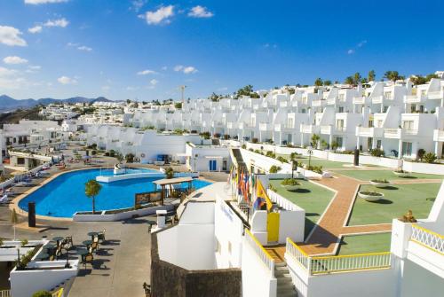 arial view of a resort with a swimming pool at BelleVue Aquarius in Puerto del Carmen