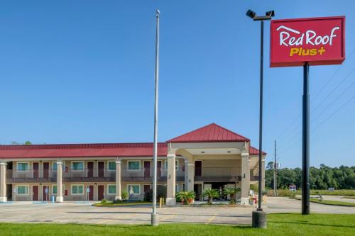 eine Darstellung eines roten Dachhotels in der Unterkunft Red Roof Inn PLUS+ Hammond in Hammond