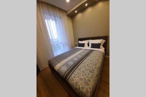 Apartamentai Giluzes Rivjera 객실 침대