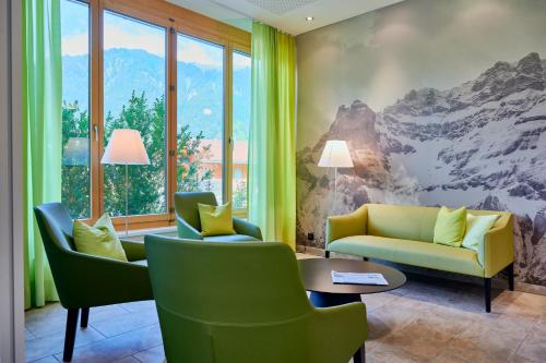 Гостиная зона в Ferien- und Familienhotel Alpina Adelboden