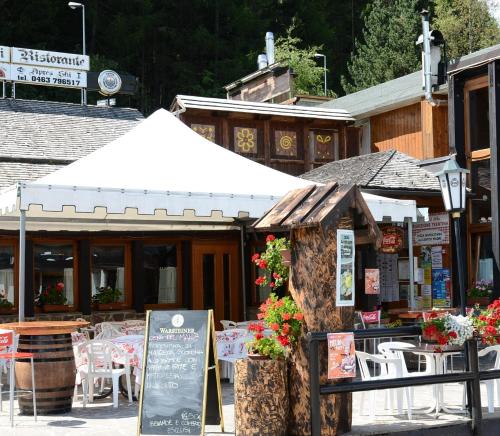 Un restaurant sau alt loc unde se poate mânca la Residence Lores 2 - Go Vacanze