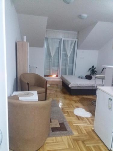 Ліжко або ліжка в номері Apartman Jaca