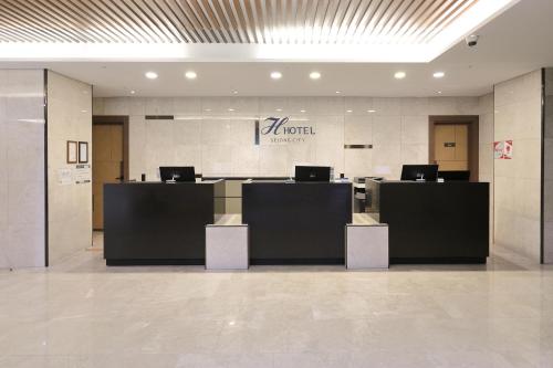 The lobby or reception area at Osong H Hotel Sejong City