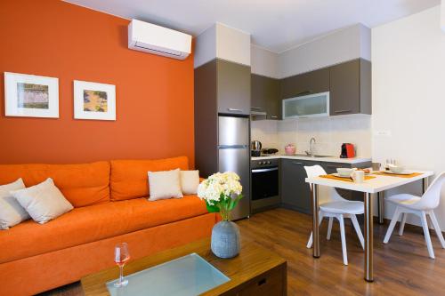 A kitchen or kitchenette at Elounda Colour Apartments