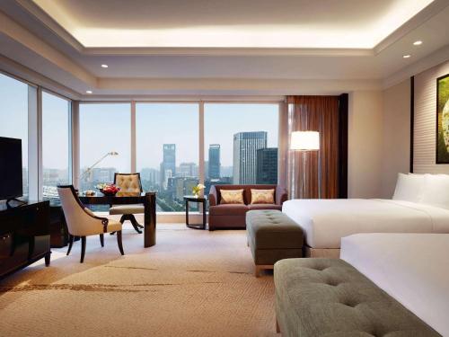 Fairmont Chengdu में एक कमरे में एक या कई बेड