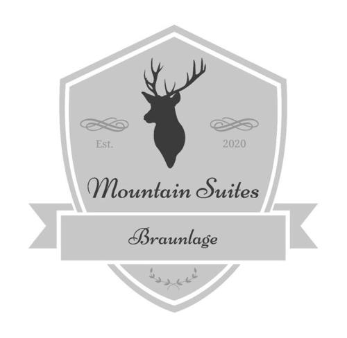 Et logo, certifikat, skilt eller en pris der bliver vist frem på Mountain Suites Braunlage