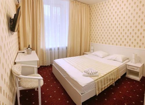 Krevet ili kreveti u jedinici u okviru objekta Sergeev Hotel